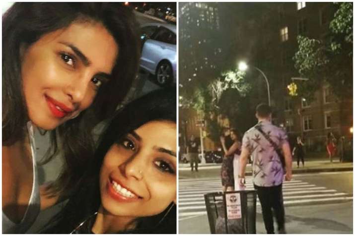 Watch Priyanka Chopra Clicks Selfie With A Fan Beau Nick Jonas Patiently Waits For Her Celebrities News India Tv