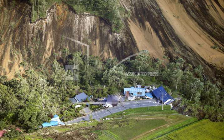 India Tv - This aerial photo shows houses destroyed by a landslide after an earthquake in Atsuma town, Hokkaido, northern Japan, Thursday, Sept. 6, 2018. (Kyodo News via AP)  
