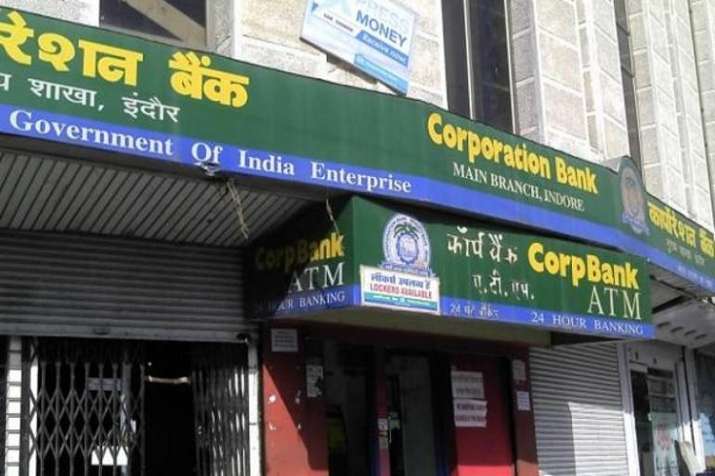 The cashier of a Corporation Bank was shot dead and three