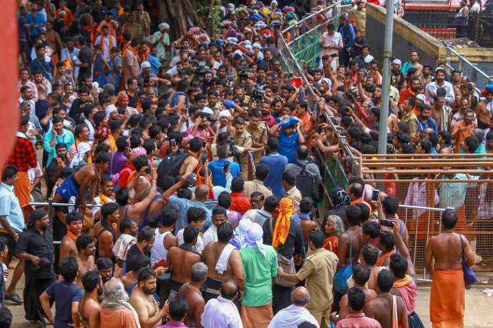 India Tv - Kerala has been witnessing protests against the entry of girls and women of menstrual age into Sabarimala temple since the government had said it would abide by the ruling of the apex court.