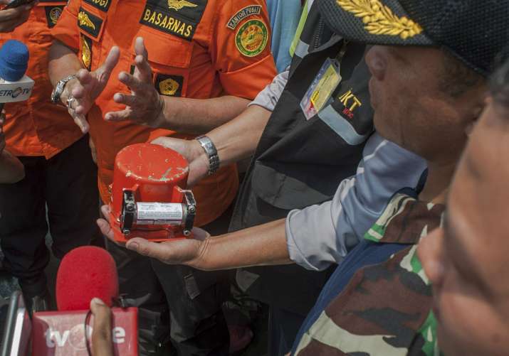 India Tv - Minutes after the device was taken out of the sea, Bambang Irawan, an investigator with the transport safety committee, said it was the flight data recorder.