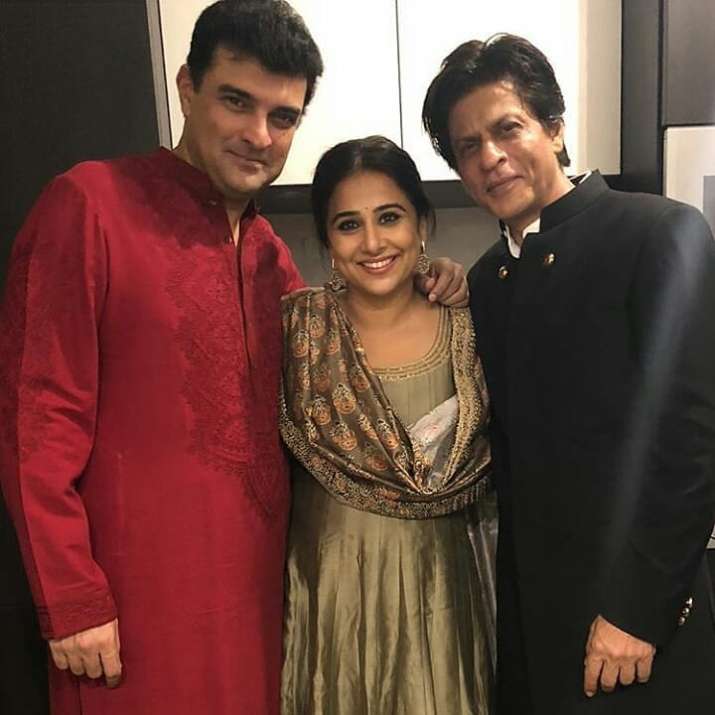 India Tv - Shah Rukh Khan poses with Vidya Balan and husband Sidharth Roy Kapur