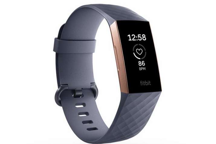 Fitbit Charge 3 fitness tracker with 7 days battery life and swim-proof ...
