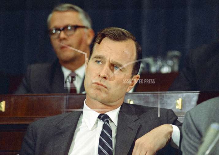 India Tv - George HW Bush (Photo taken on March 6, 1968)  (AP Photo/Charles Tasnadi, File)
