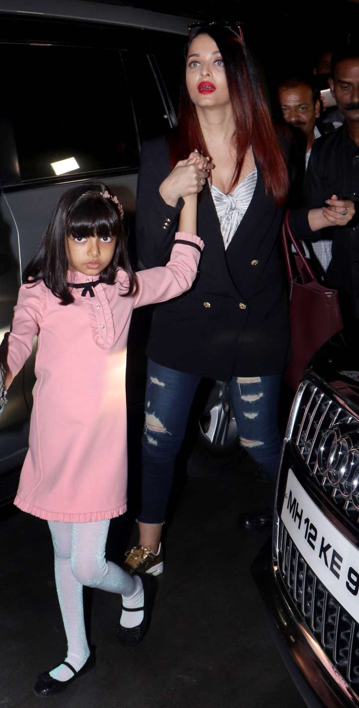 India Tv - Aishwarya Rai Bachchan, Abhishek Bachchan with Aaradhya