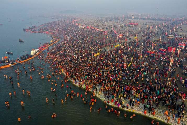 India Tv - Devotees take a holy dip on the occasion of 'Paush Purnima' during Kumbh Mela  