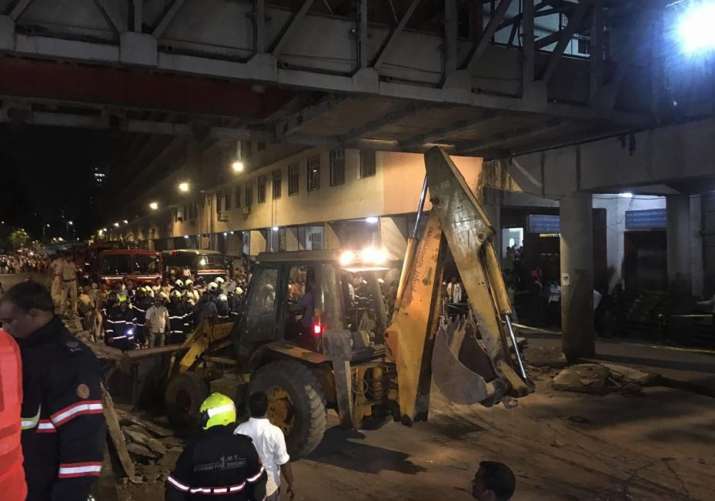 India Tv - Mumbai: Rescue work in progress after a foot overbridge near CSMT station collapsed