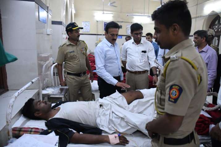 India Tv - Maharashtra Minister Girish Mahajan meeting the injured at GT Hospital