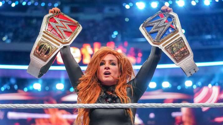 India Tv - Becky Lynch defeats Ronda Rousey, Charlotte Flair to become RAW and Smackdown champion
