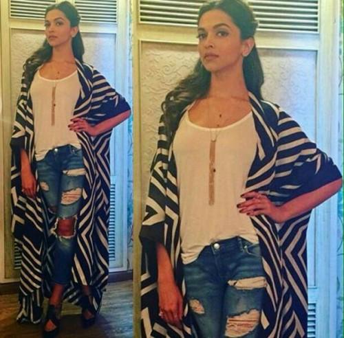India Tv - Deepika Padukone's black and white shrug