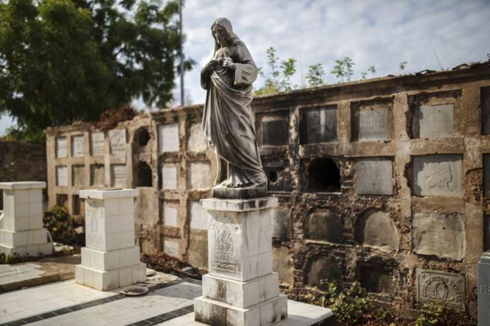 Even the dead aren't safe in Maracaibo, a sweltering,