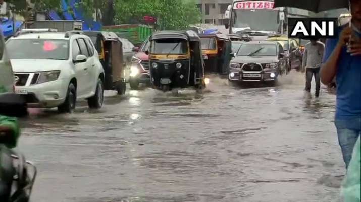 Mumbai Rains Live Updates: Lower areas submerged, local trains delayed ...