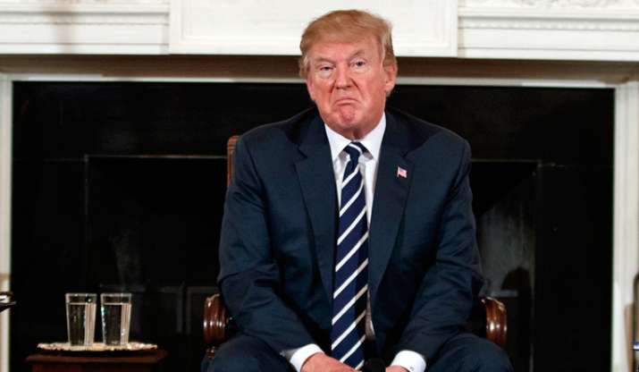 President Trump on Friday blamed inclement weather and a