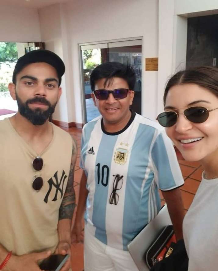 India Tv - Anushka Sharma and Virat Kohli with a fan