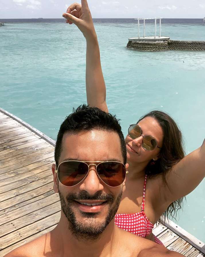 Neha Dhupia Slays In Red Swimwear As She Poses With Husband Angad Bedi In Maldives See Pics 