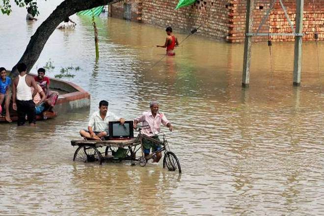 Four persons were killed and over 5,000 were evacuated in Gujarat which was battered by nearly 500 m