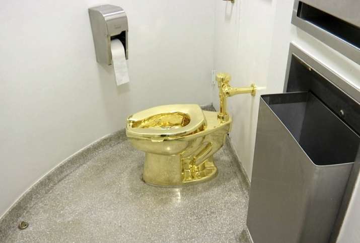 Solid gold toilet worth up to 1 million pounds stolen from
