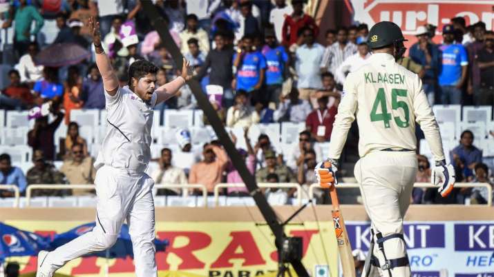 Indian bowler Umesh Yadav celebrates the dismissal of South