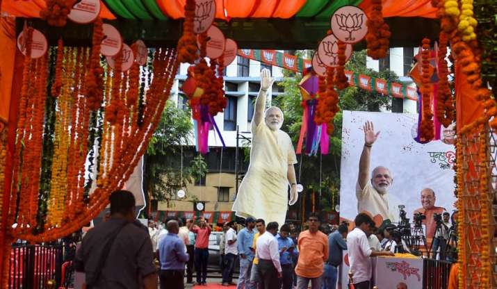Party workers gather outside BJP office in Mumbai.