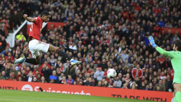 Manchester United's Marcus Rashford scores his side's