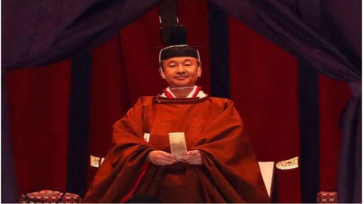 Naruhito, 59, made the remarks wearing a dark orange robe