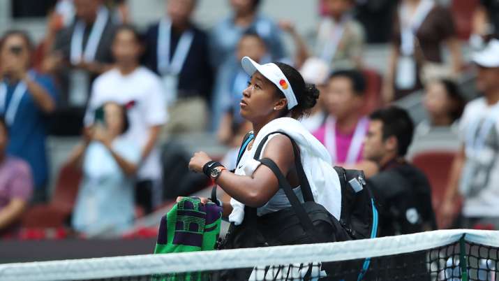 Naomi Osaka of Japan celebrates after defeating Alison