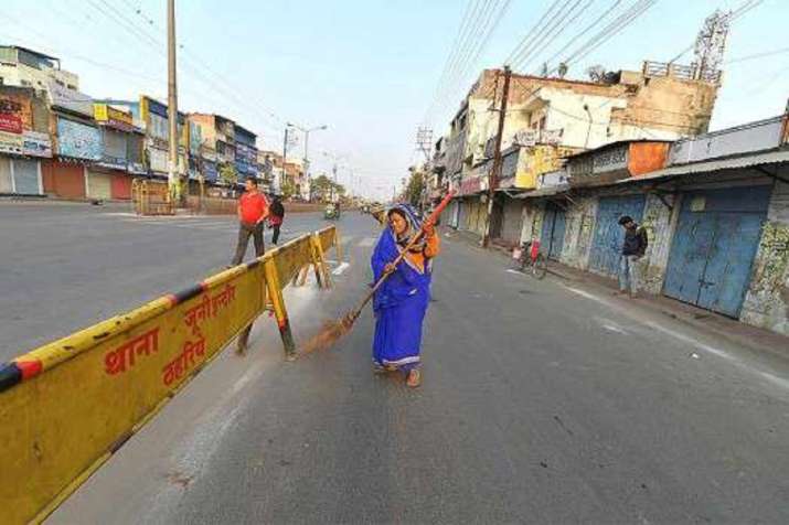 Man made to collect garbage as punishment for open defecation