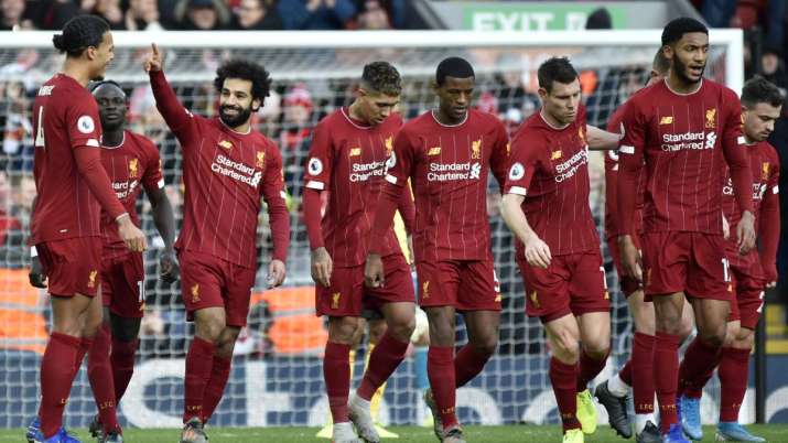 Liverpool's Mohamed Salah, 3rd left, celebrates with