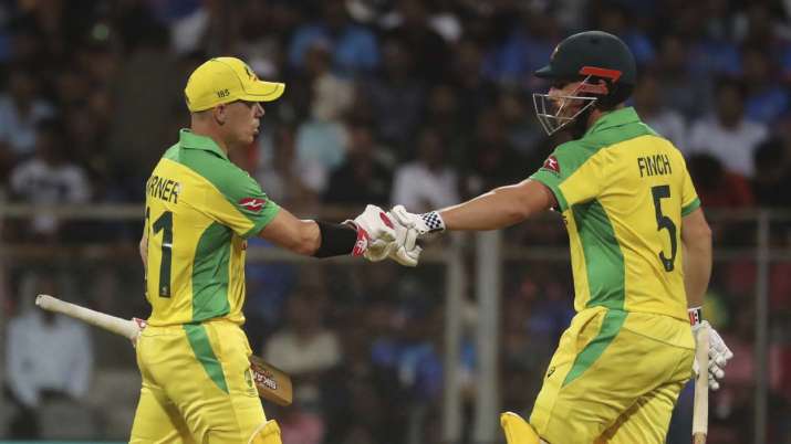 Australia's captain Aaron Finch, right, and David Warner