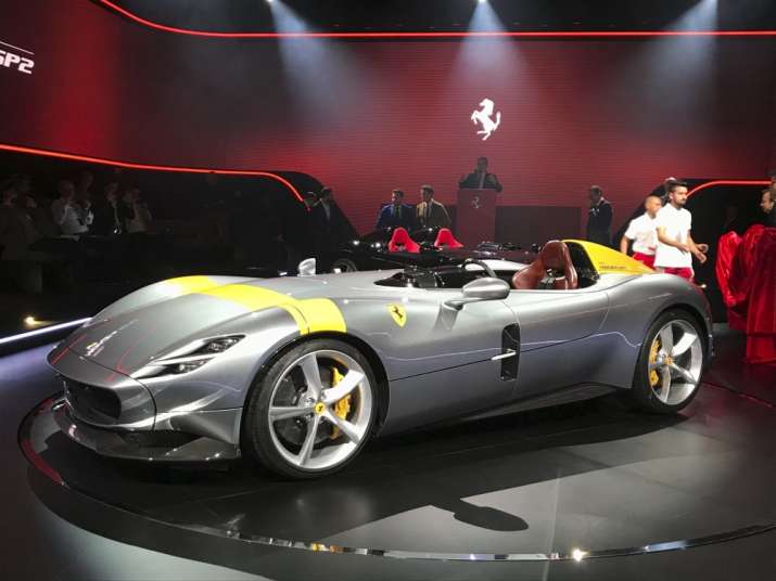 Ferrari reports 11% profit drop last year but raises