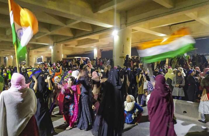 Women gather near Delhi's Jaffrabad metro station to
