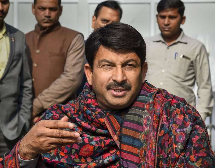 Delhi BJP Chief Manoj Tiwari speaks to the media at his