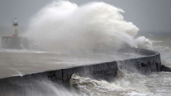 Waves crash into the wall at Newhaven south east England,
