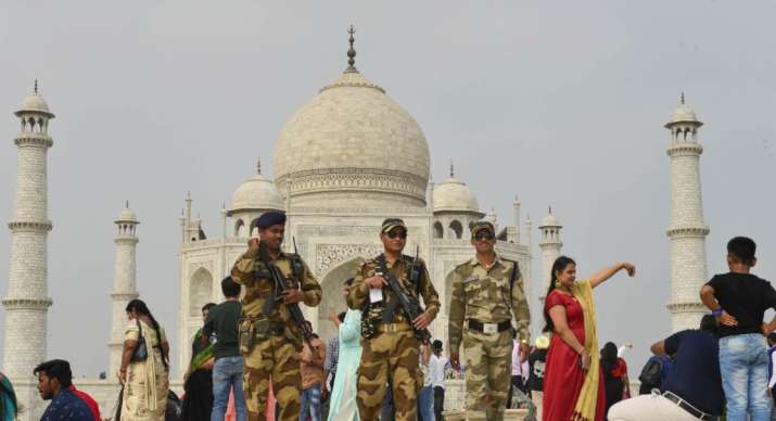 India Tv - Central Industrial Security Force personnel patrol in the premises of Taj Mahal ahead of US Presiden