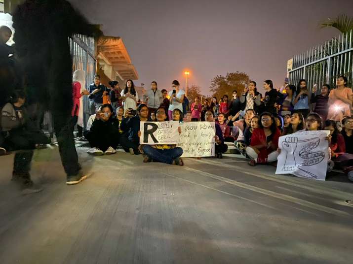 Students protesting against the imposition of curfew on