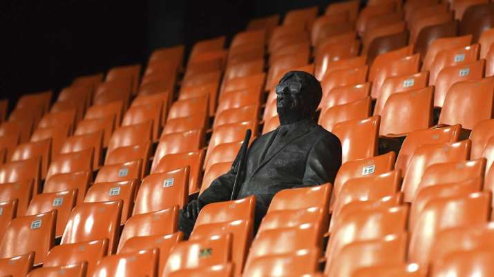 A statue representing a former fan is pictured ahead of the