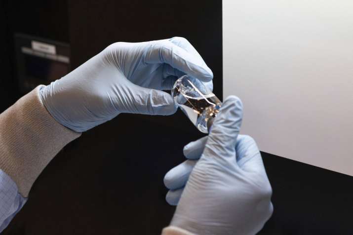 In this March 2020 photo provided by Gilead Sciences, a vial of the investigational drug remdesivir