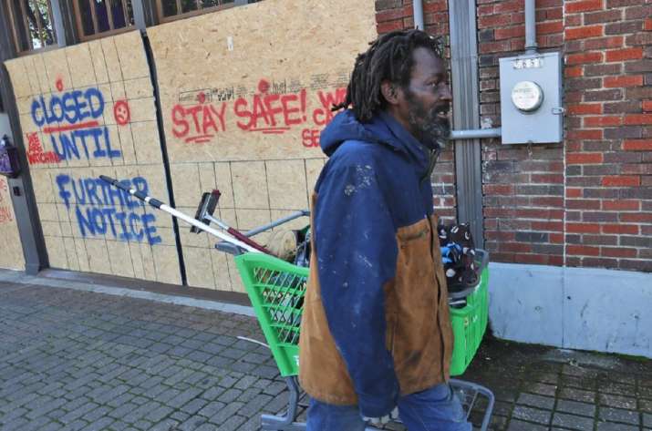 In this Tuesday, March 31, 2020 file photo, Vincent Amos,