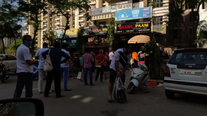 India Tv - noida panic buying, panic buying in noida, noida ration shops, noida panic buying news, 