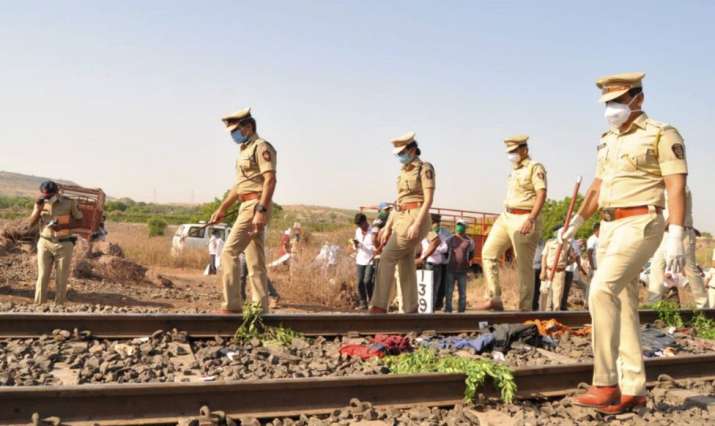 Aurangabad: Police personnel inspect the spot after a goods