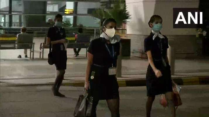 India Tv - Flight attendants arrive at IGI airpot