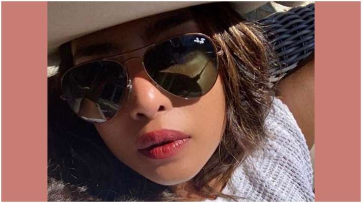 Priyanka Chopra Jonas Is Basking In The Sun With Hat And A Cherry Lip