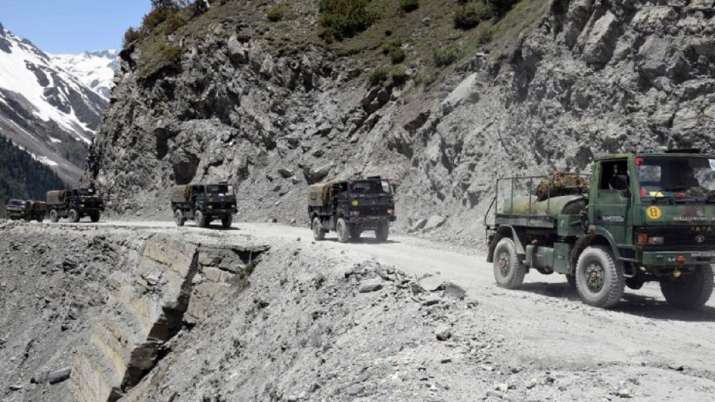 An army convoy moving towards the Zojilla pass, in Drass,