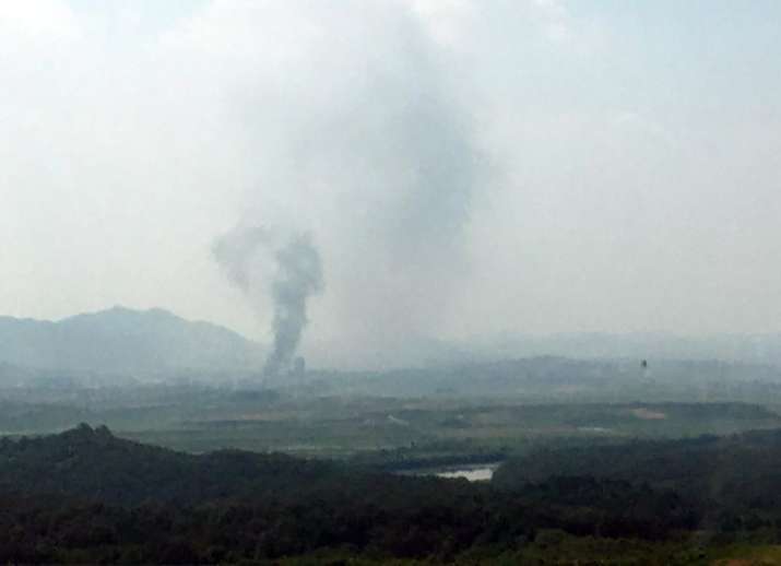 Smoke rises in the North Korean border town of Kaesong, seen from Paju, South Korea, Tuesday, June 1