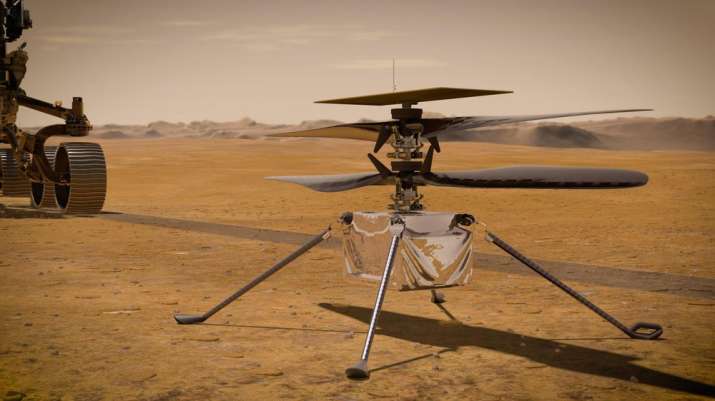 India Tv - This illustration made available by NASA depicts the Ingenuity Mars Helicopter on the red planet's s