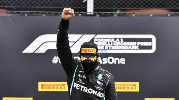 F1 star Lewis Hamilton raises right fist in fight against racism after winning Styrian GP