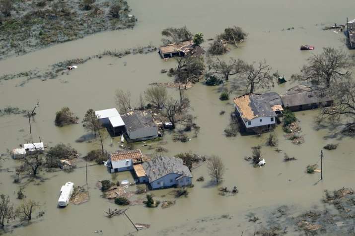 India Tv - Buildings and homes are flooded in the aftermath of Hurricane Laura Thursday, Aug. 27, 2020, near La