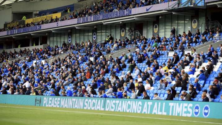 Brighton soccer fans adhere to social distancing measures