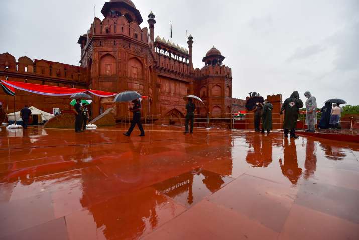 India Tv - New Delhi: Security personnel during the full dress rehearsals for the 74th Independence Day celebrations, amid the ongoing COVID-19 pandemic, on a rainy day at Red Fort in New Delhi, Thursday, Aug. 13, 2020.   