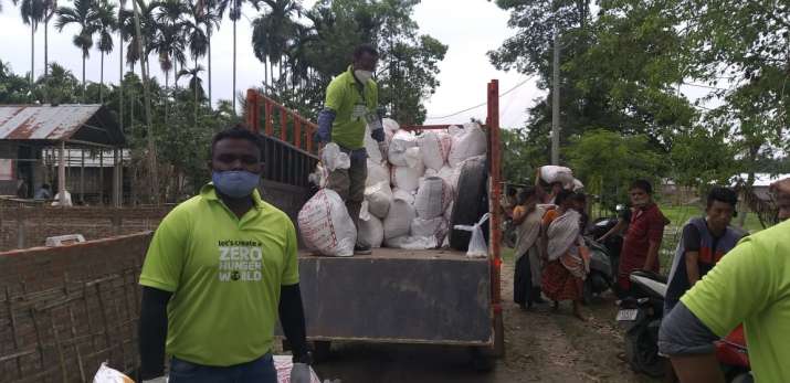 India Tv - Zomato Feed India joins hand with NSS to distribute food to 1000 families in Assam flood area